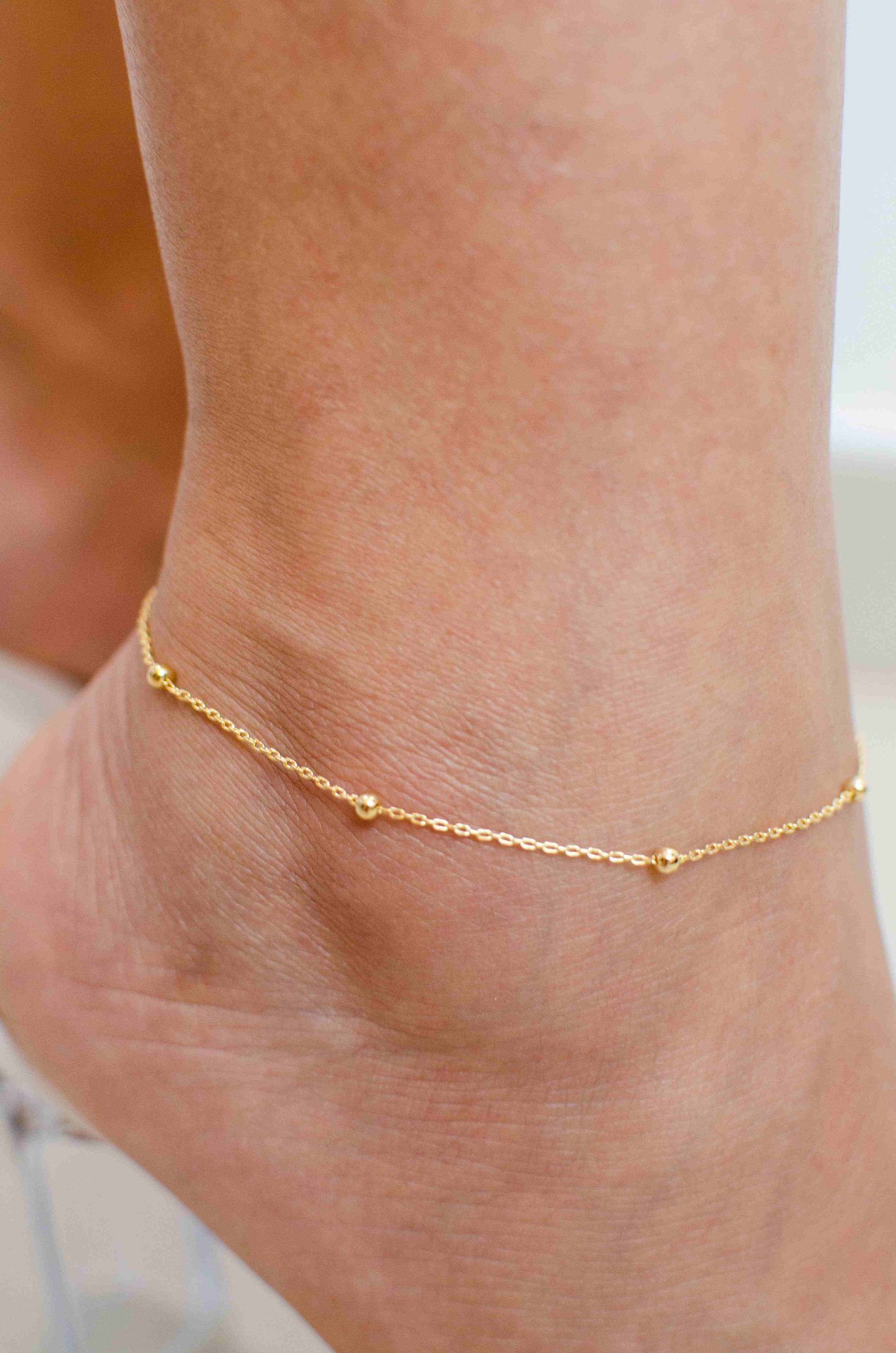 Tornozeleira Bolinhas Banhado a Ouro 18k